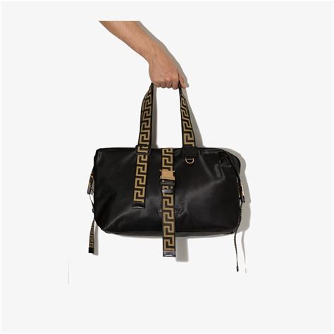 versace fashion black bag|Versace holdall bag.